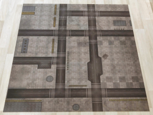 Cityscape battle mat laid out on the floor