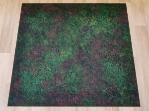 Forest battle mat laid out on the floor
